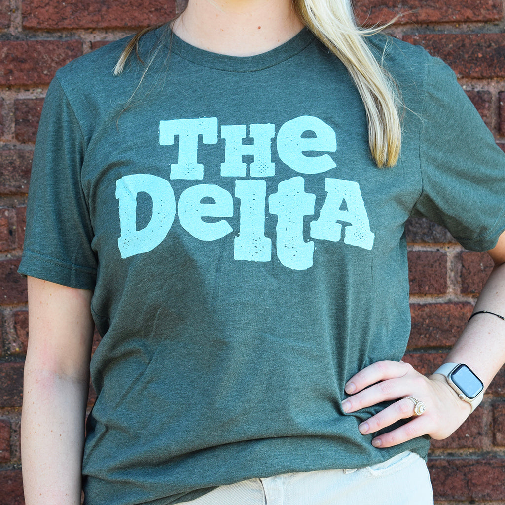 image of a green tee shirt that says The Delta