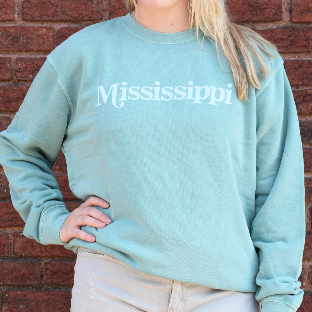 image of a light blue sweatshirt that says Mississippi